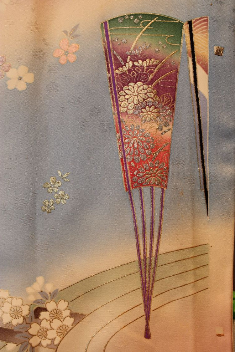 detail of hand painted silk with gold stencillng 